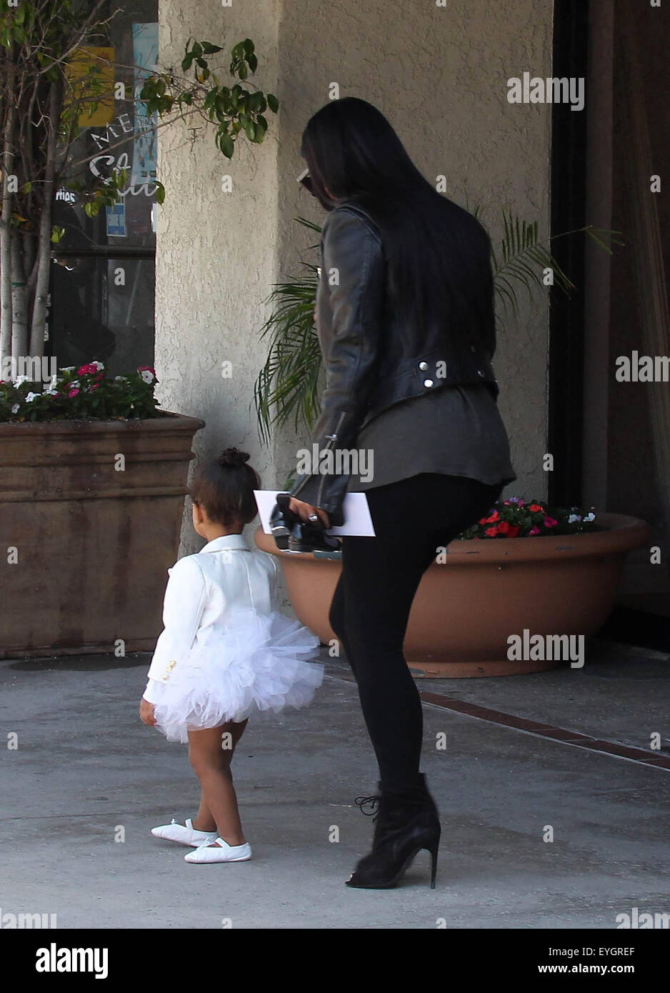 Kim Kardashian takes Nori and Penelope to a ballet class  Featuring: Kim Kardashian, Nori West Where: Tarzana, California,, United States When: 28 May 2015 C Stock Photo