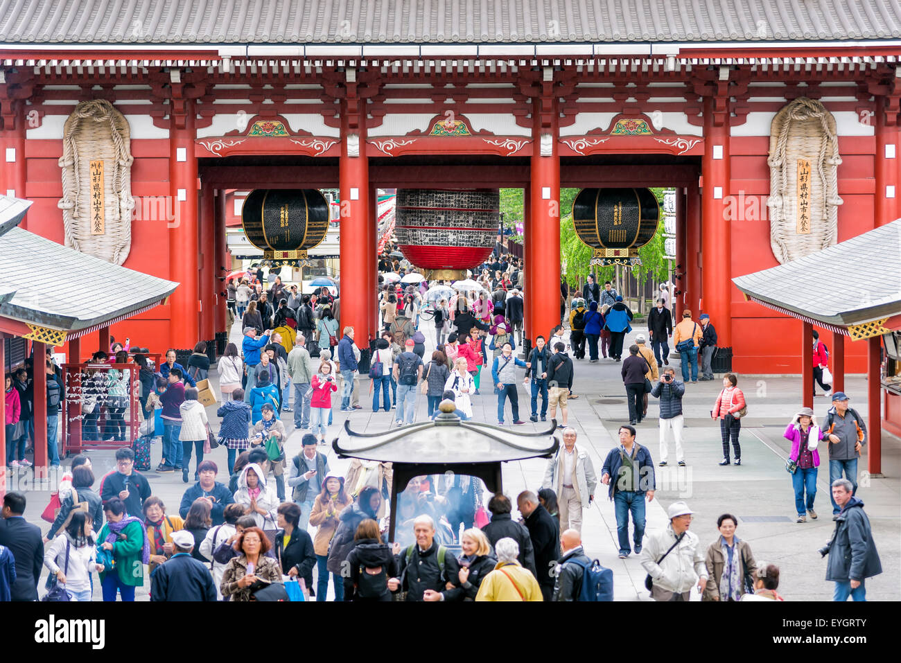 Tokyo, Japan - April 21, 2014: People visiting Sensoji Temple in Asakusa district in Tokyo. Sensoji is Tokyo's oldest temple. Stock Photo