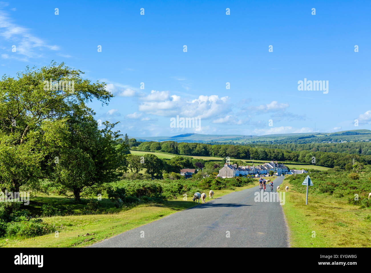 Cyclists on the road near Clearbrook, Dartmoor National Park, Devon, England, UK Stock Photo