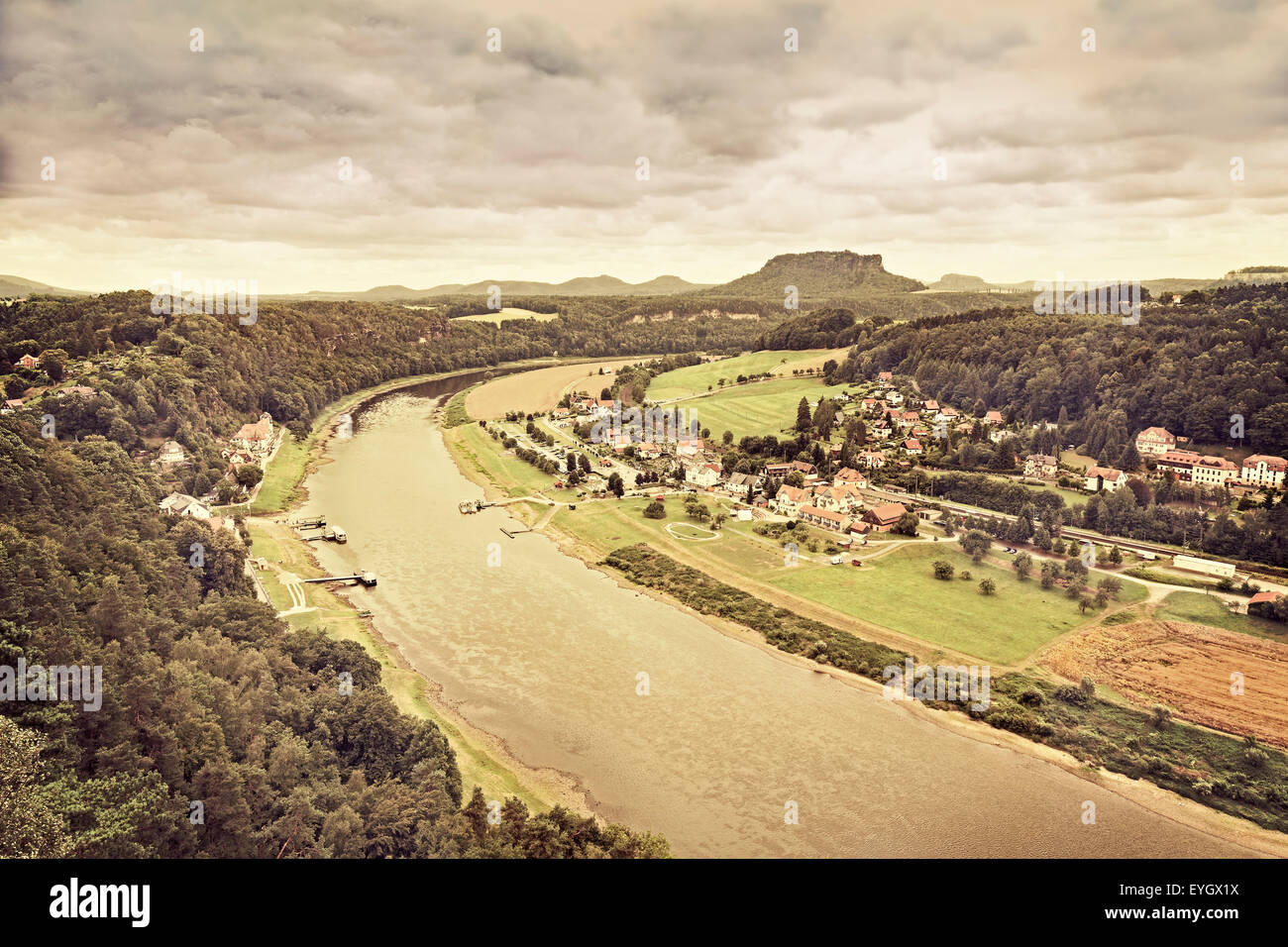 Retro sepia toned panoramic view of Rathen and Elbe river from Bastei, Germany Stock Photo