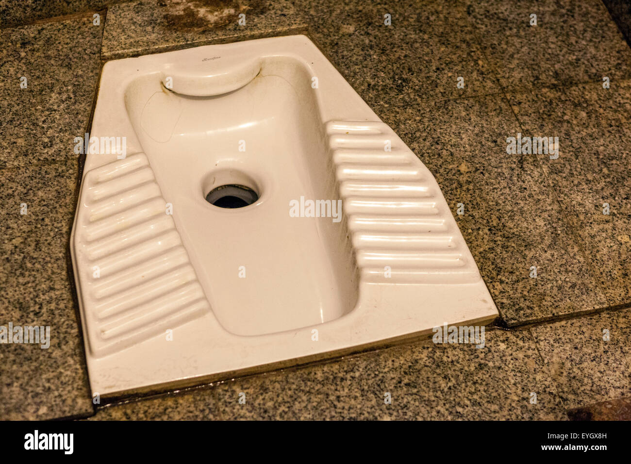 Public Turkish toilet at the bus station Fira Santorini Greece Stock Photo