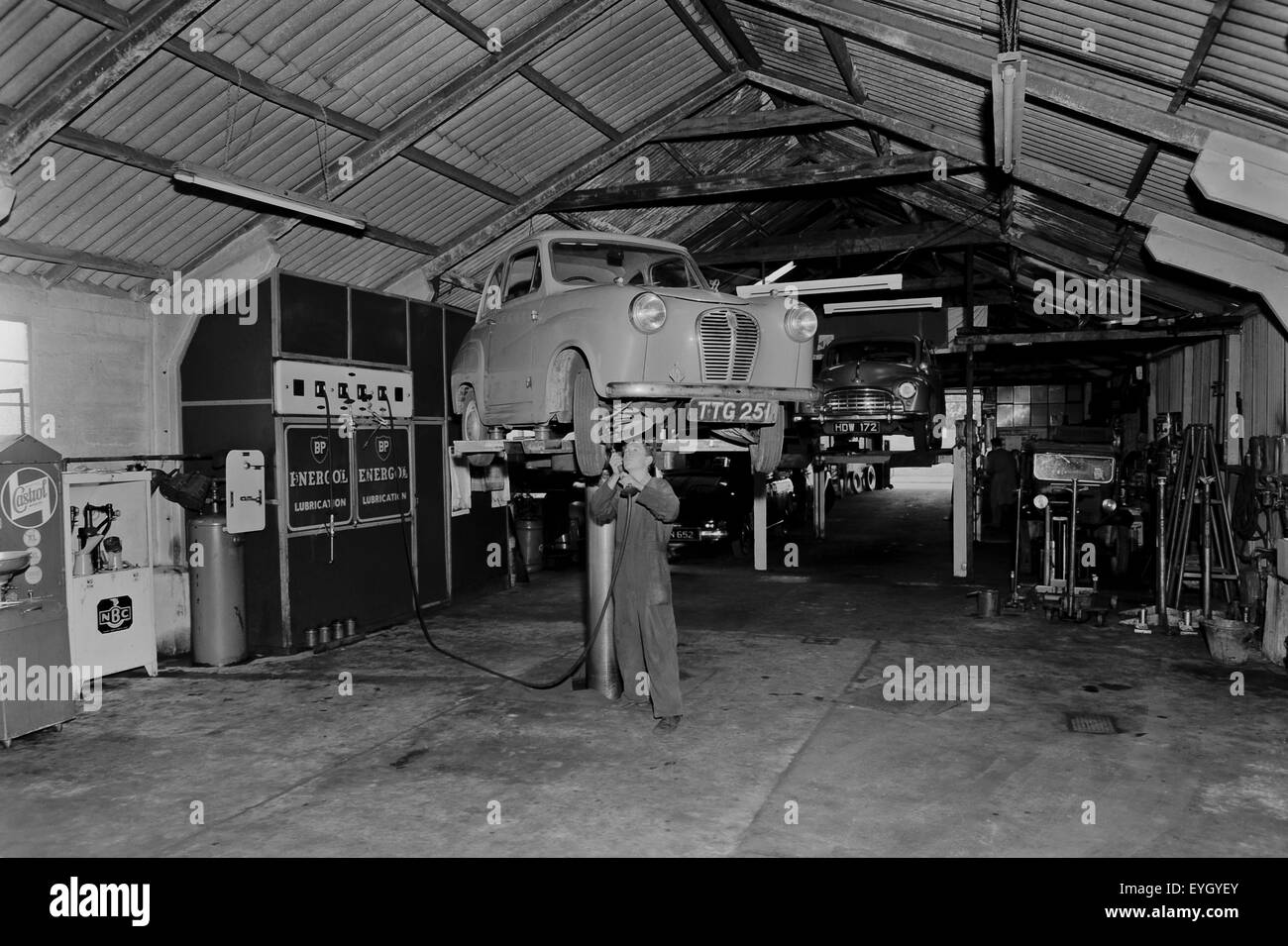 Cardiff 1960; Garage Interior with mechanic Stock Photo Alamy