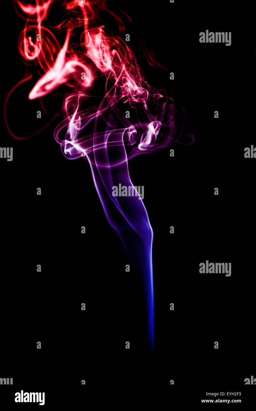 Colorful smoke on a black background Stock Photo - Alamy