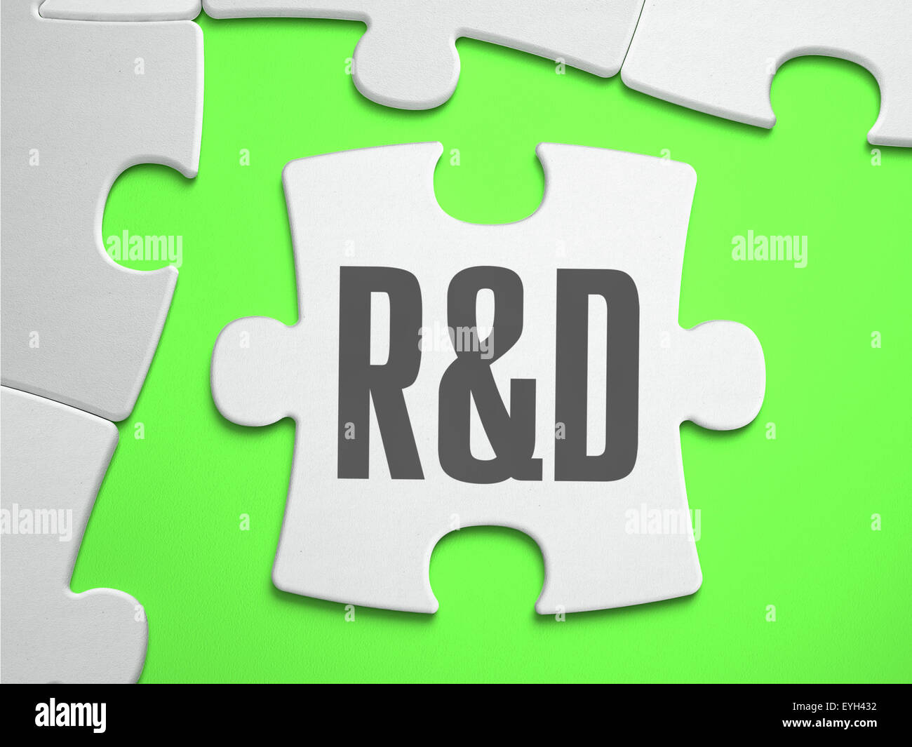 Research and Development - Jigsaw Puzzle with Missing Pieces. Stock Photo
