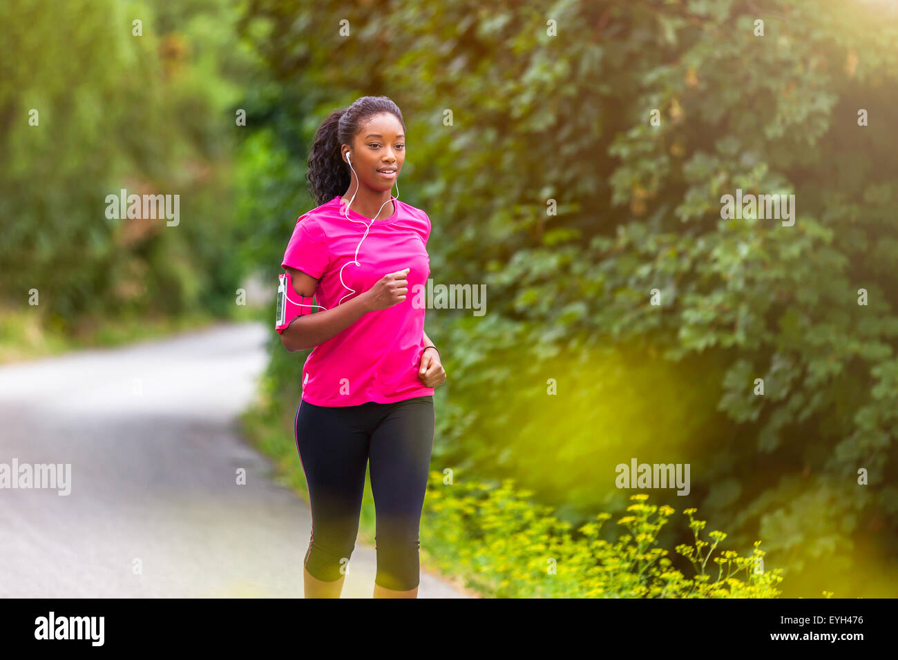 African American Woman Runner Jogging Outdoors Stock Photo 304509992