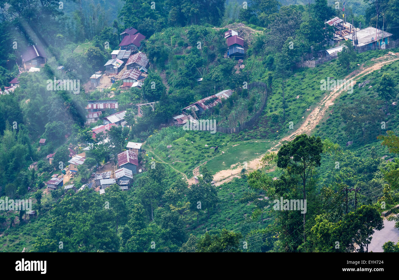 Idyllic Mountain village of North Bengal Himalayas, India beside a tea garden with copy space Stock Photo