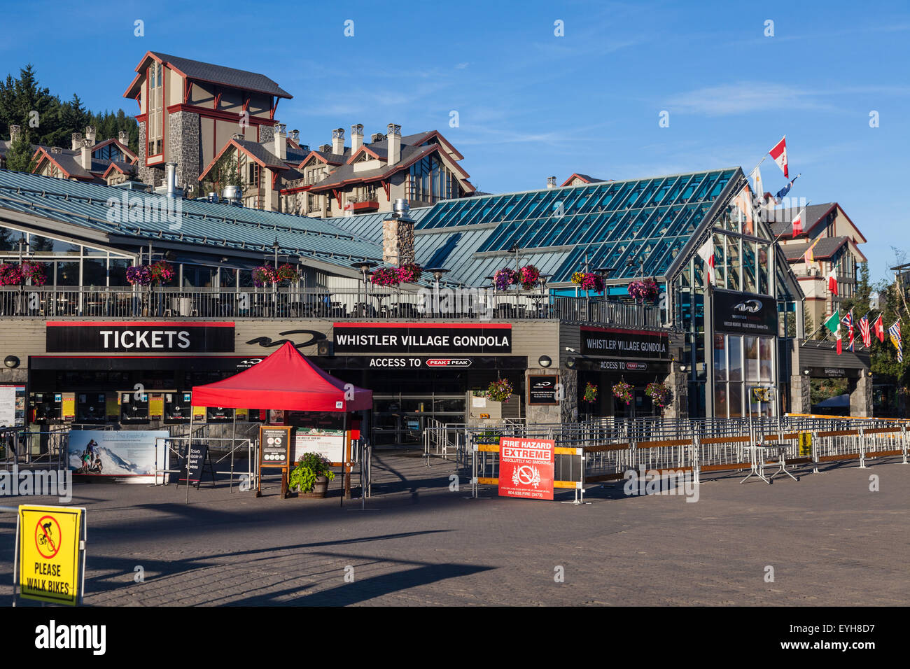 Early morning in Whistler Village waiting for the lifts to open for mountain bike riders Stock Photo