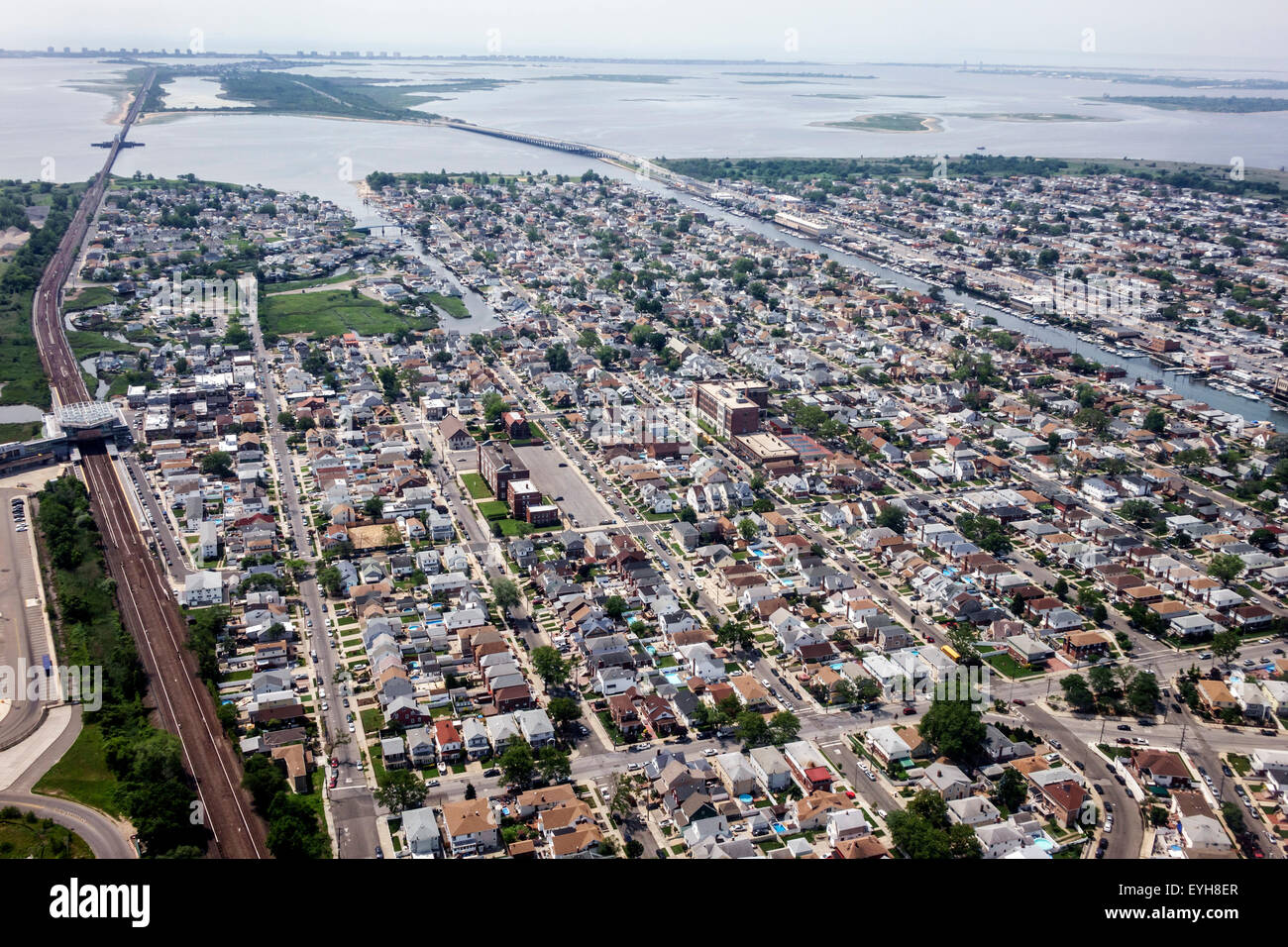New York City,NY NYC,Northeast,Queens,John F. Kennedy International Airport,JFK,aerial overhead view from above,approach,Jamaica Bay water,Howard Beac Stock Photo