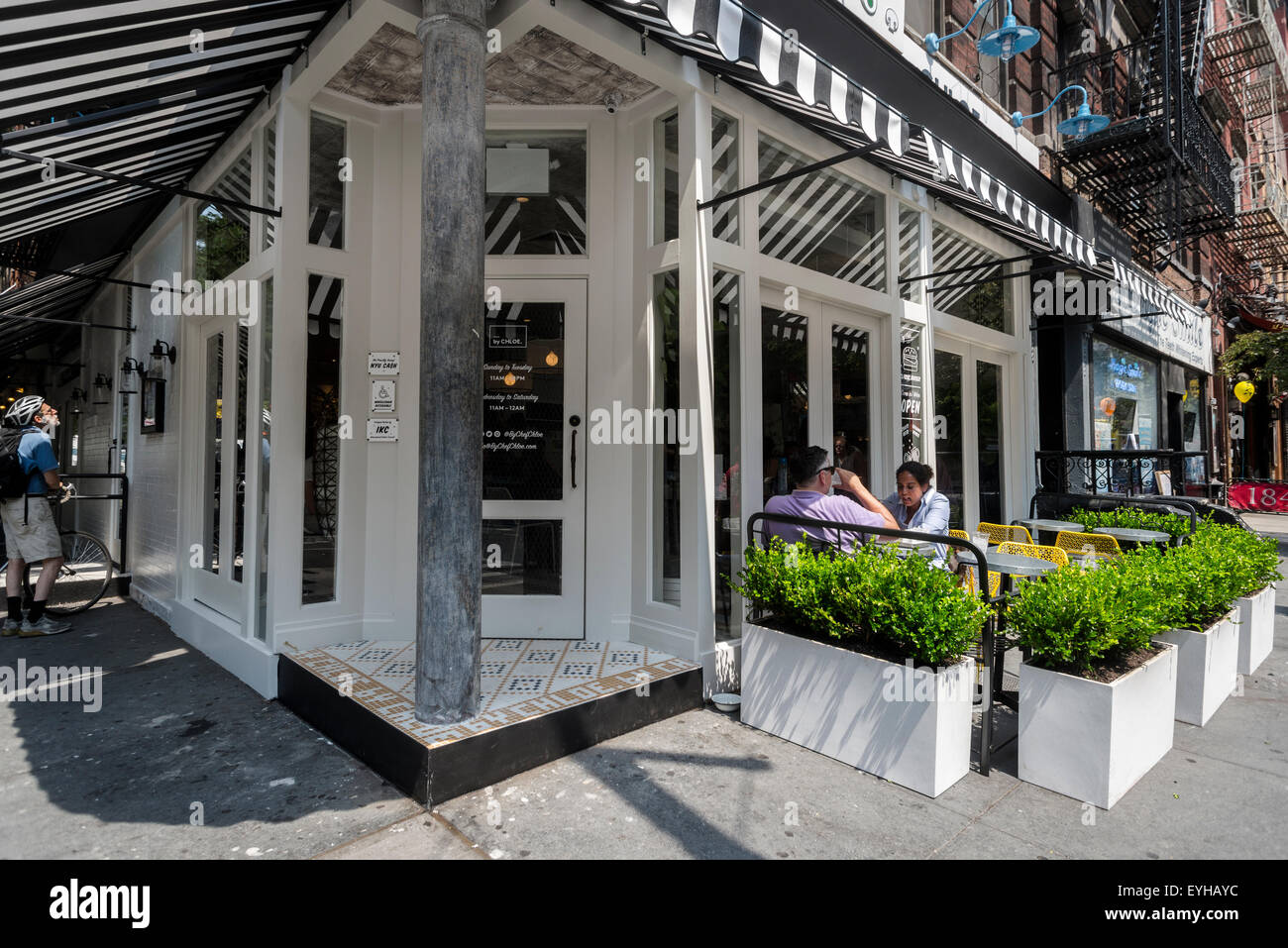 New York, NY 29 July 2015  By Chloe, a fruit and yogurt parlour, opens at the corner of Bleecker and MacDougal. The site previously housed Caffe Ciao, and Caffe Borgia Stock Photo