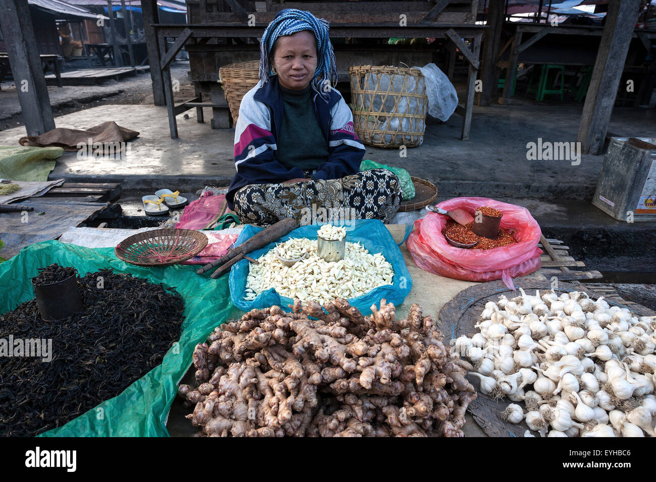 Local woman selling vegetables at the market in Nyaungshwe, Shan State, Myanmar Stock Photo