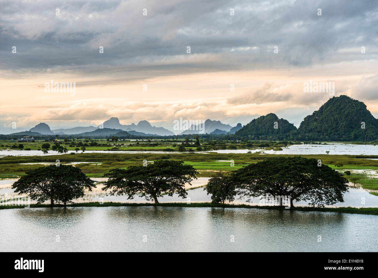Sunset above tower karst mountains, artificial lake, landscape in the evening light, Hpa-an, Karen or Kayin State, Myanmar Stock Photo