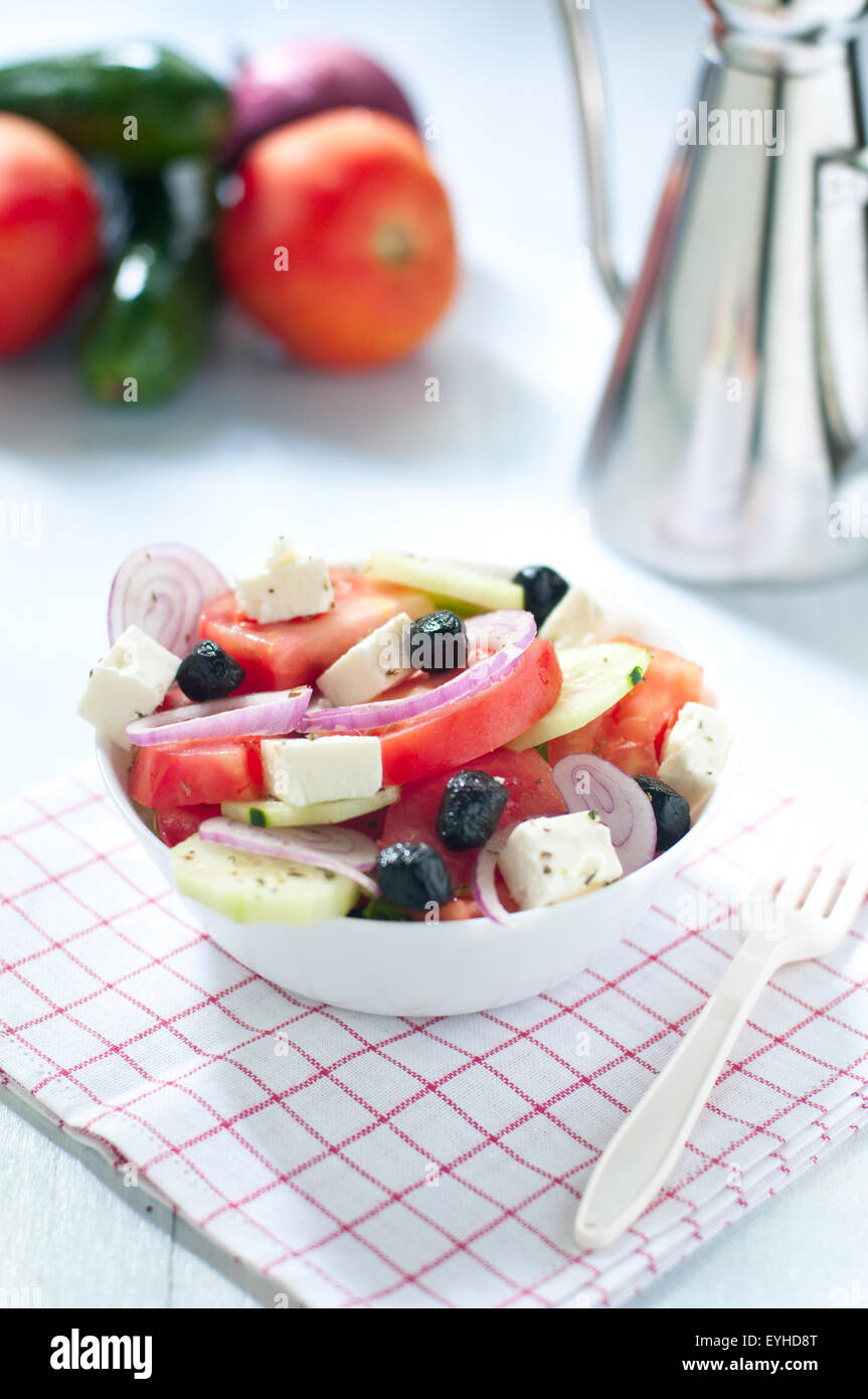 Greek salad with feta cheese tomatoes cucumbers and black olives Stock Photo