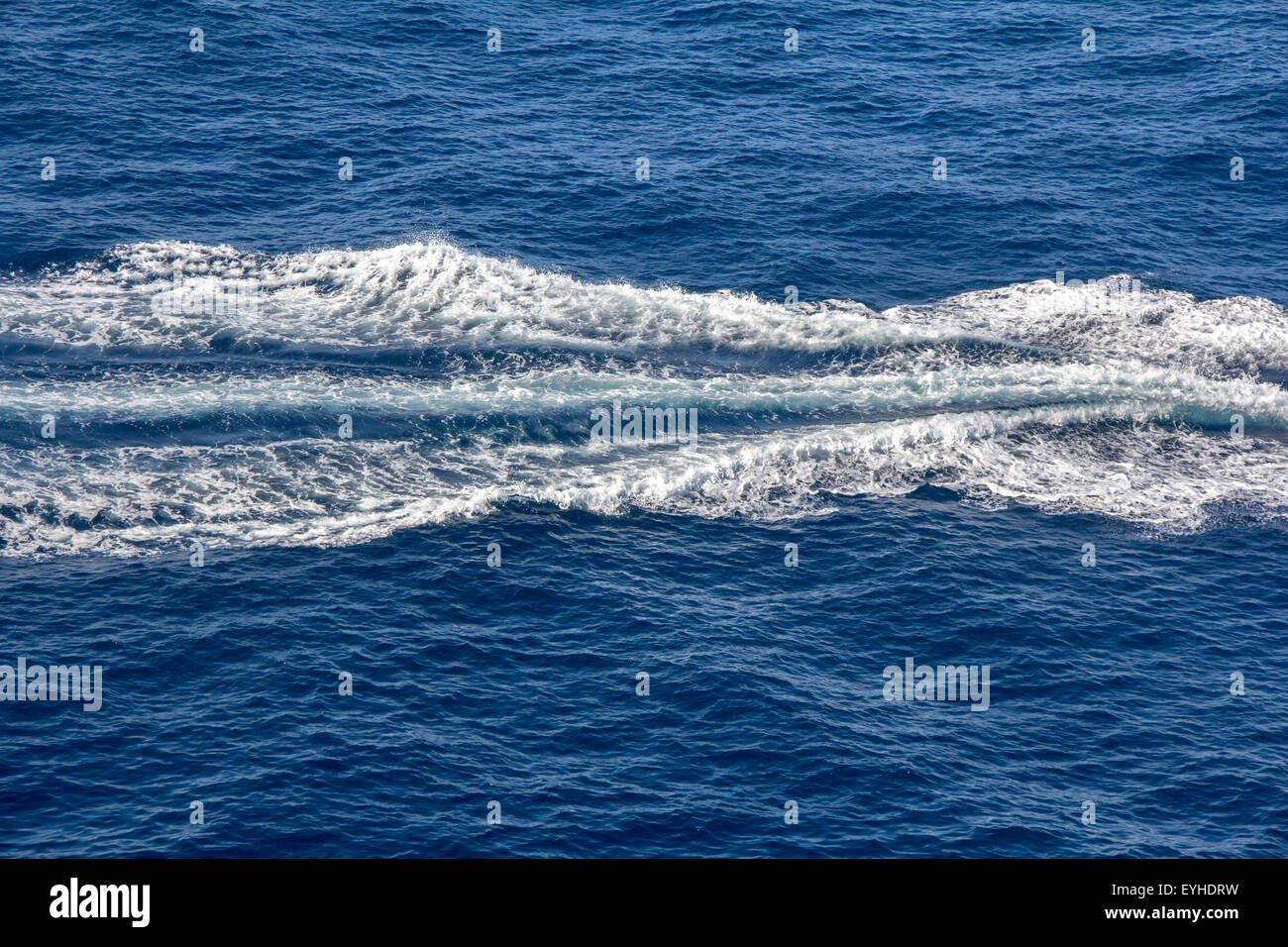 Trace of Speed boats on the blue sea Stock Photo