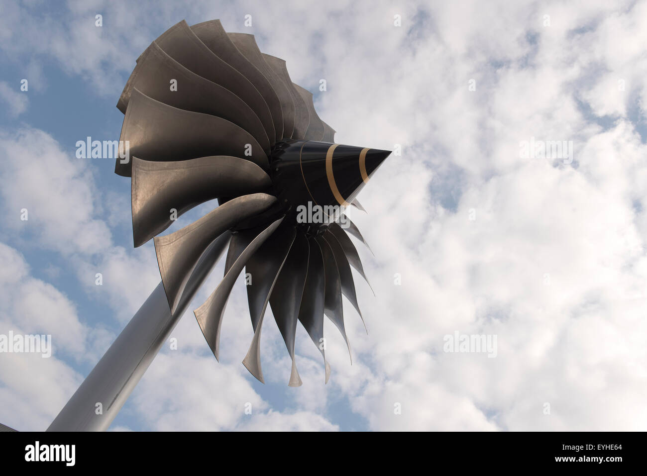 Sculpture made from an aircraft jet engine shot against the sky outside East Midlands Airport Terminal Stock Photo