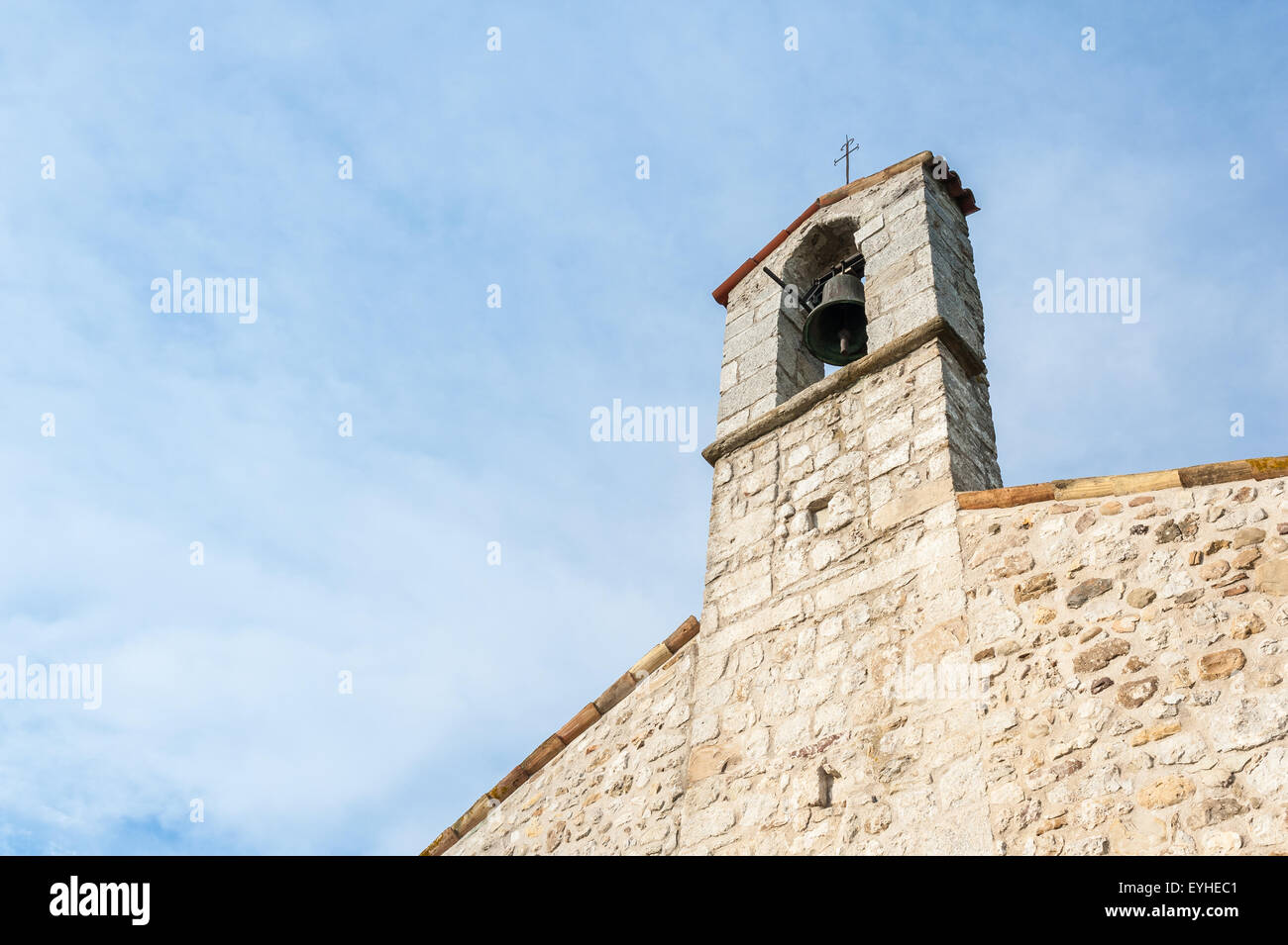 Small bell tower with a bell of a country church in the 13th century