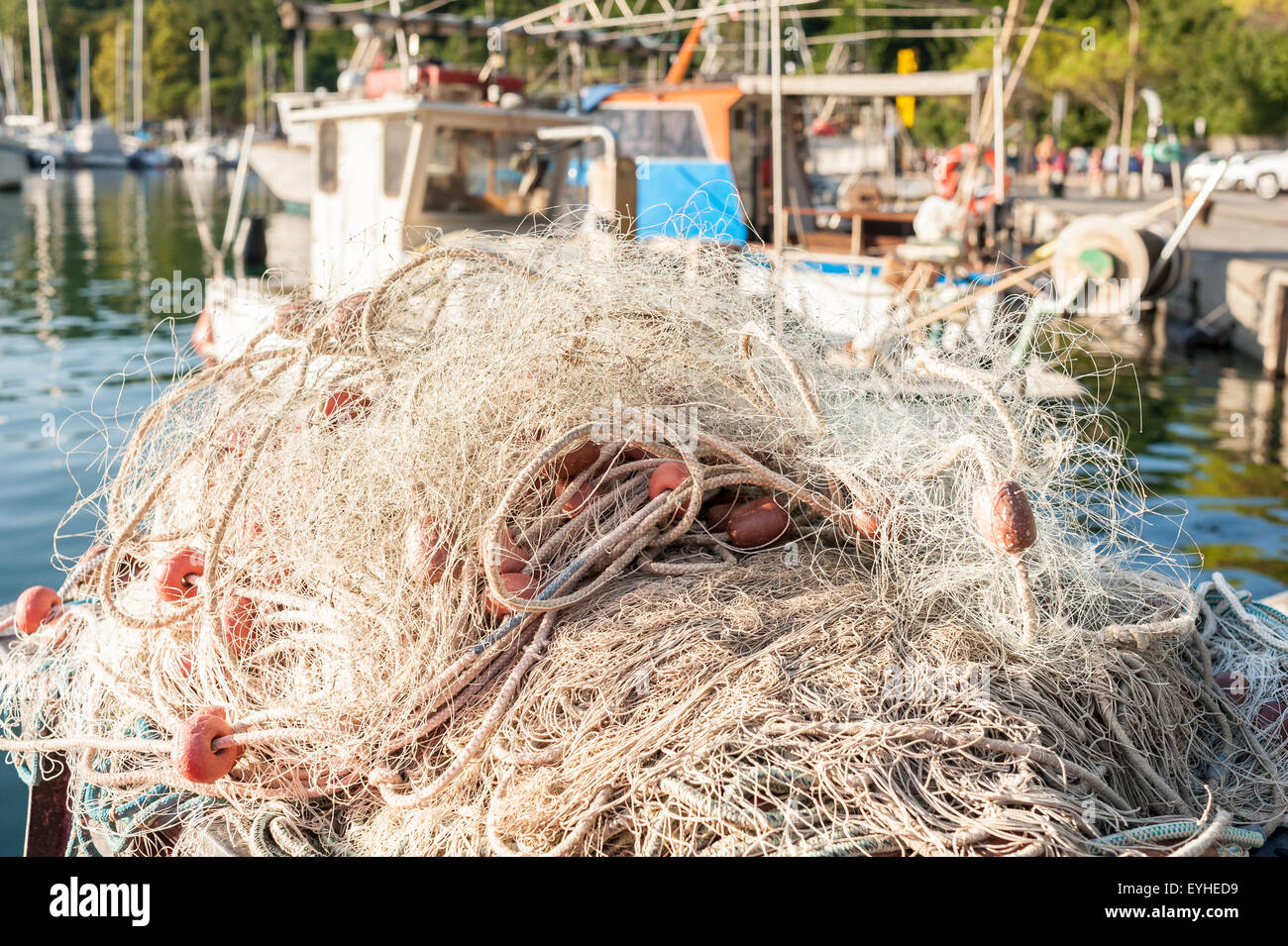 Fishing net drying in the sun Stock Photo