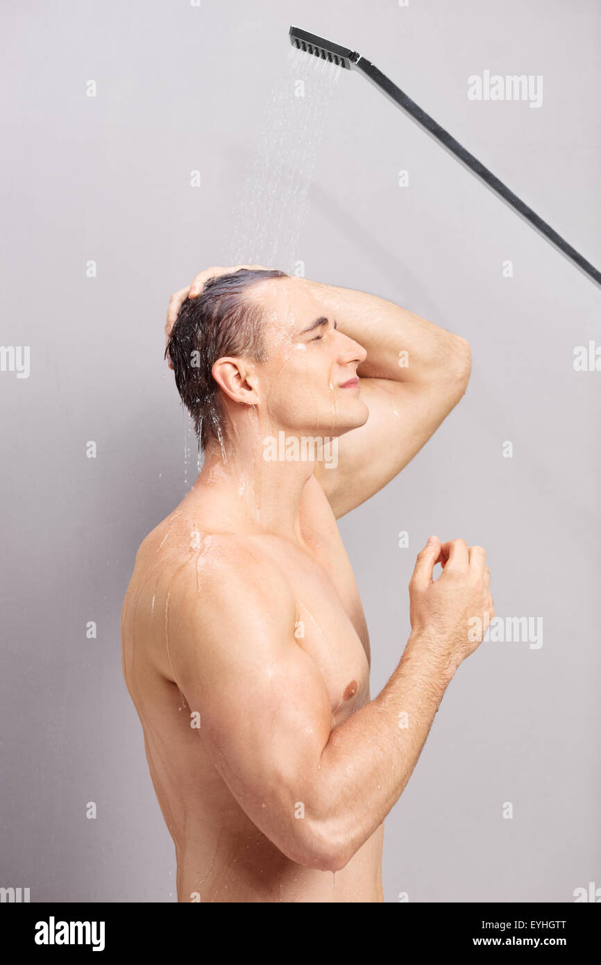 Showering young man hires stock photography and images Alamy