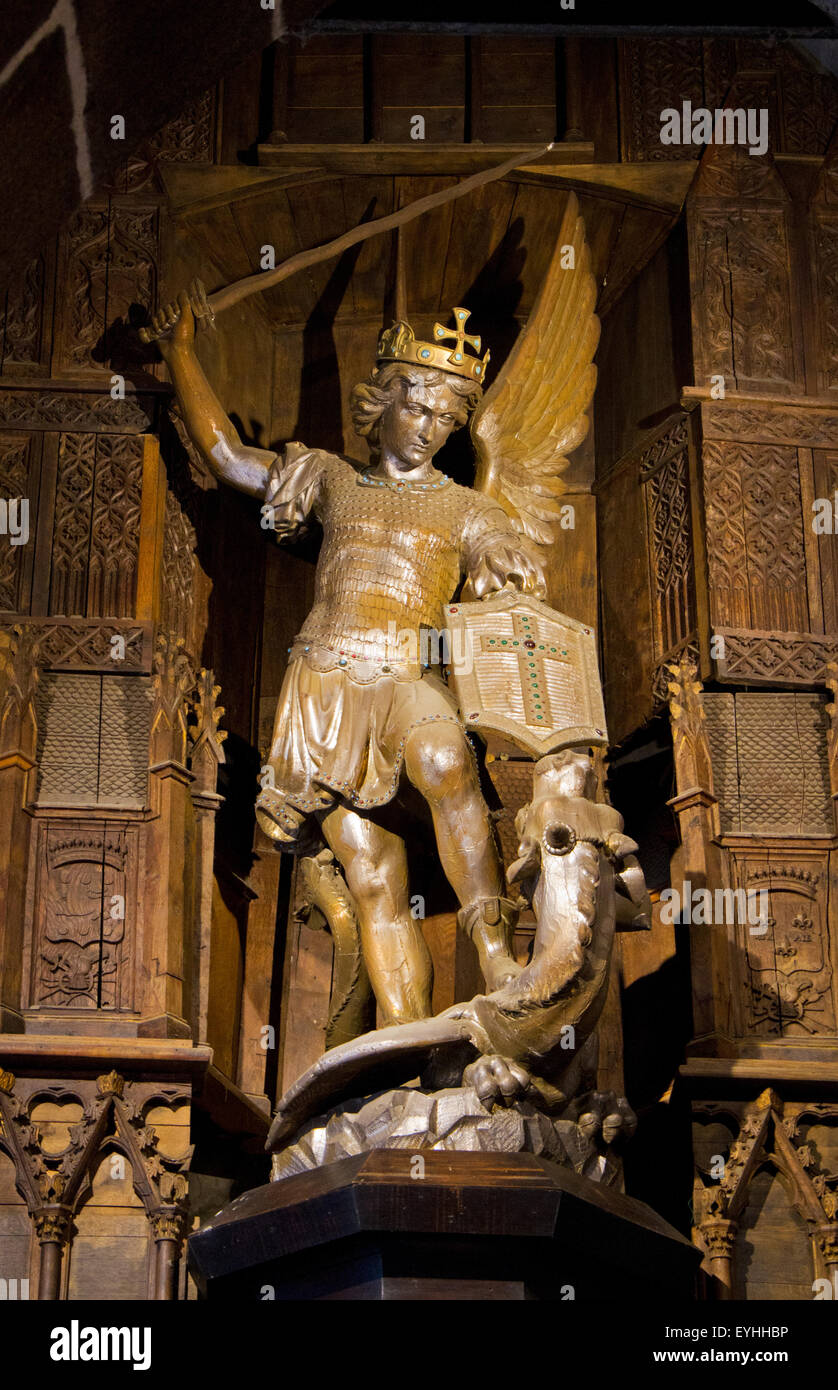 Saint George killing the dragon, a statue in the chapel of Mont Saint Michael Stock Photo