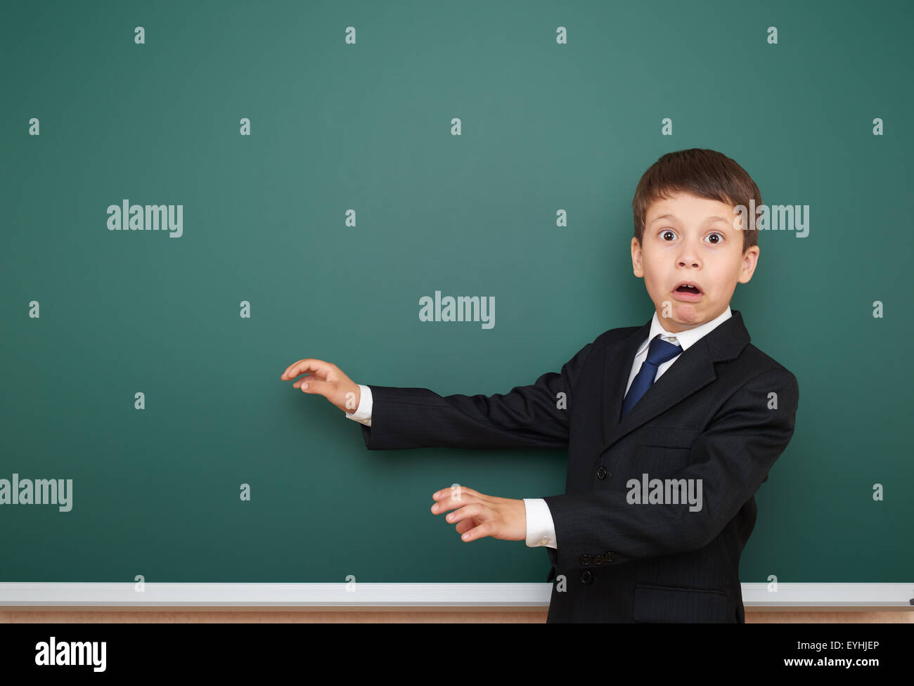 school boy portrait on board background Stock Photo - Alamy