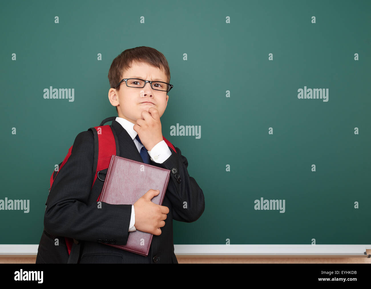 school boy portrait on board background Stock Photo - Alamy