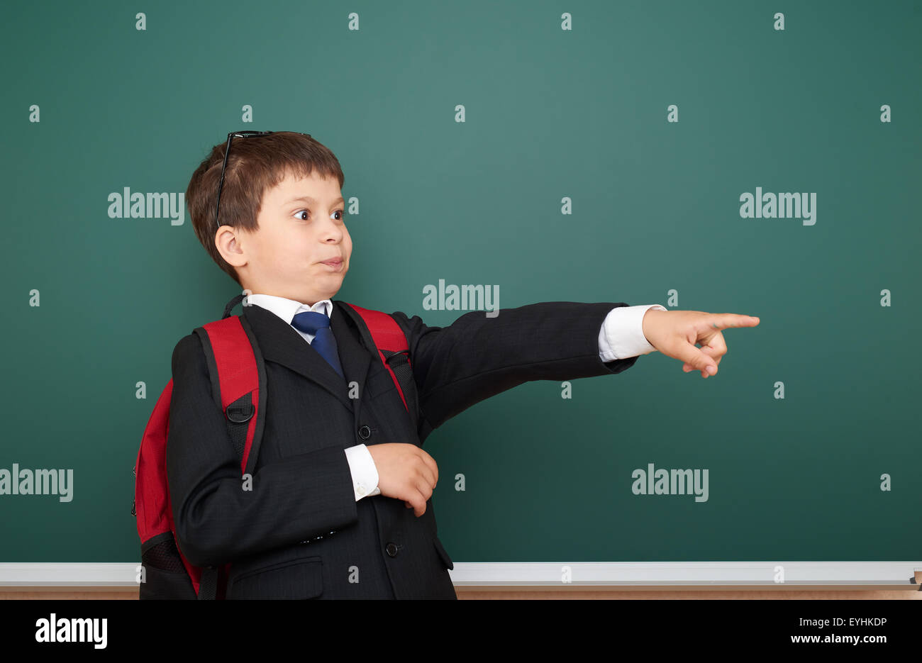 school boy portrait on board background Stock Photo - Alamy