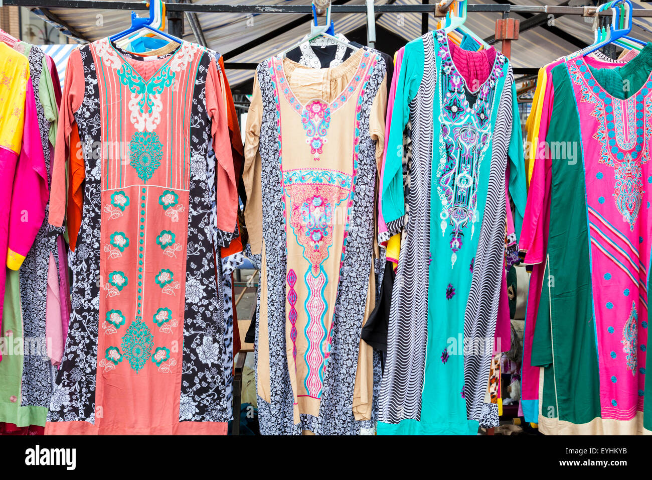Asian clothing. Shalwar kameez for sale on a market stall, Walsall, West Midlands, England, UK Stock Photo