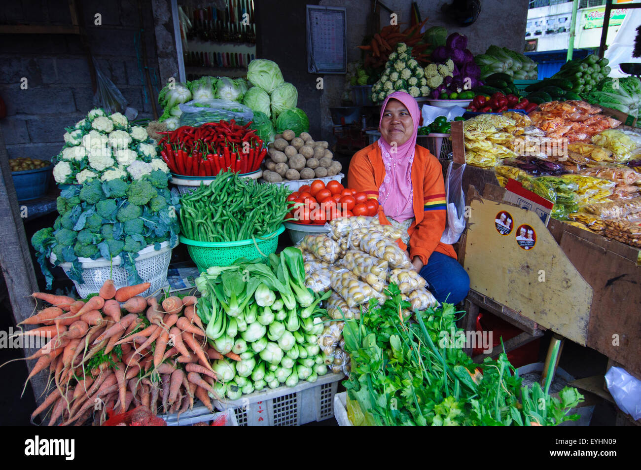 A vegetable seller and her wares, Bedugul, Bali, Indonesia (No MR) Stock Photo