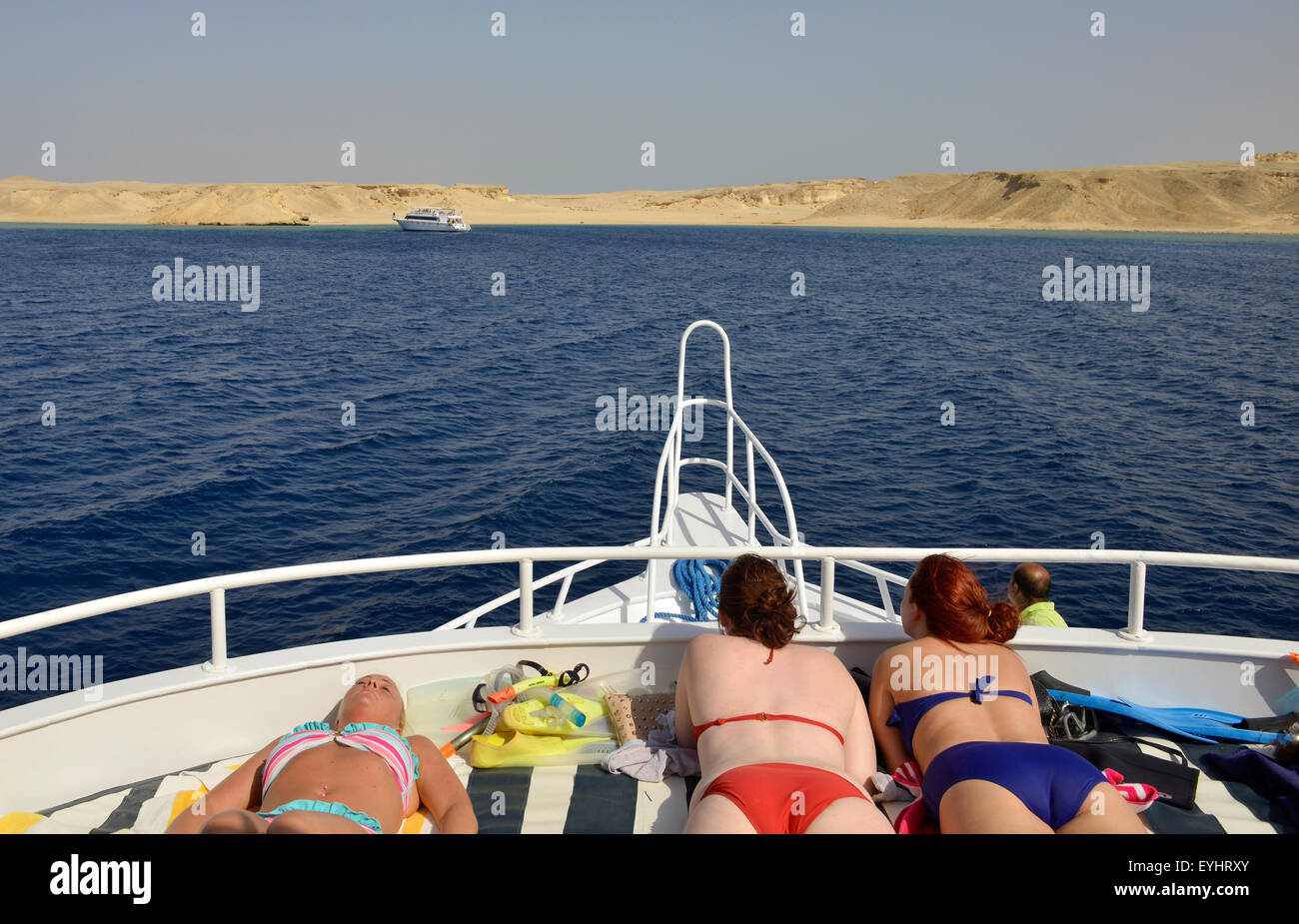 Tourist boat, Red Sea, Sinai, Egypt, tourists sunbathe on a boat Stock Photo