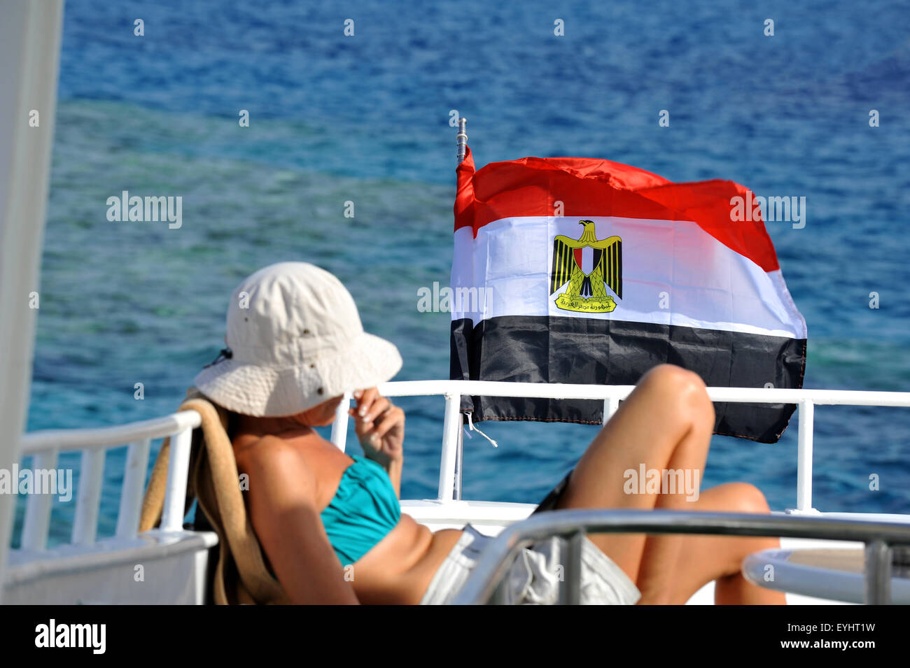 Tourist and flag of Egypt, Red Sea, Sinai, Egypt Stock Photo