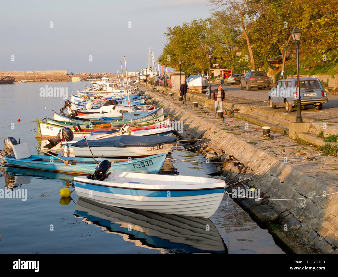 Fisherman boats on sunset Stock Photo