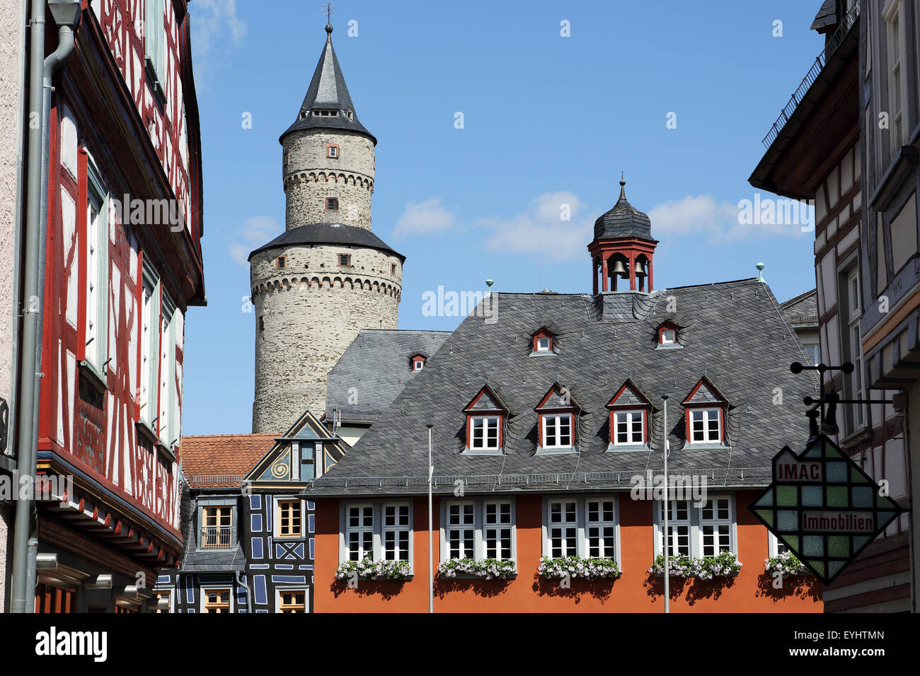 Halif-timbered buildings and the Hexenturm ('Witches Tower) in Idstein, Germany. Stock Photo