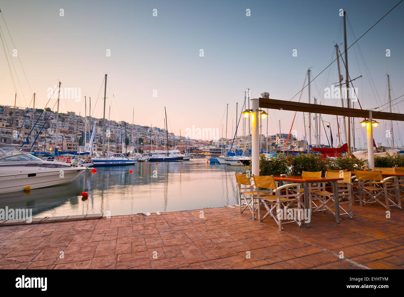 sail-boats-at-the-coffee-shop-of-the-yacht-club-in-mikrolimano-marina