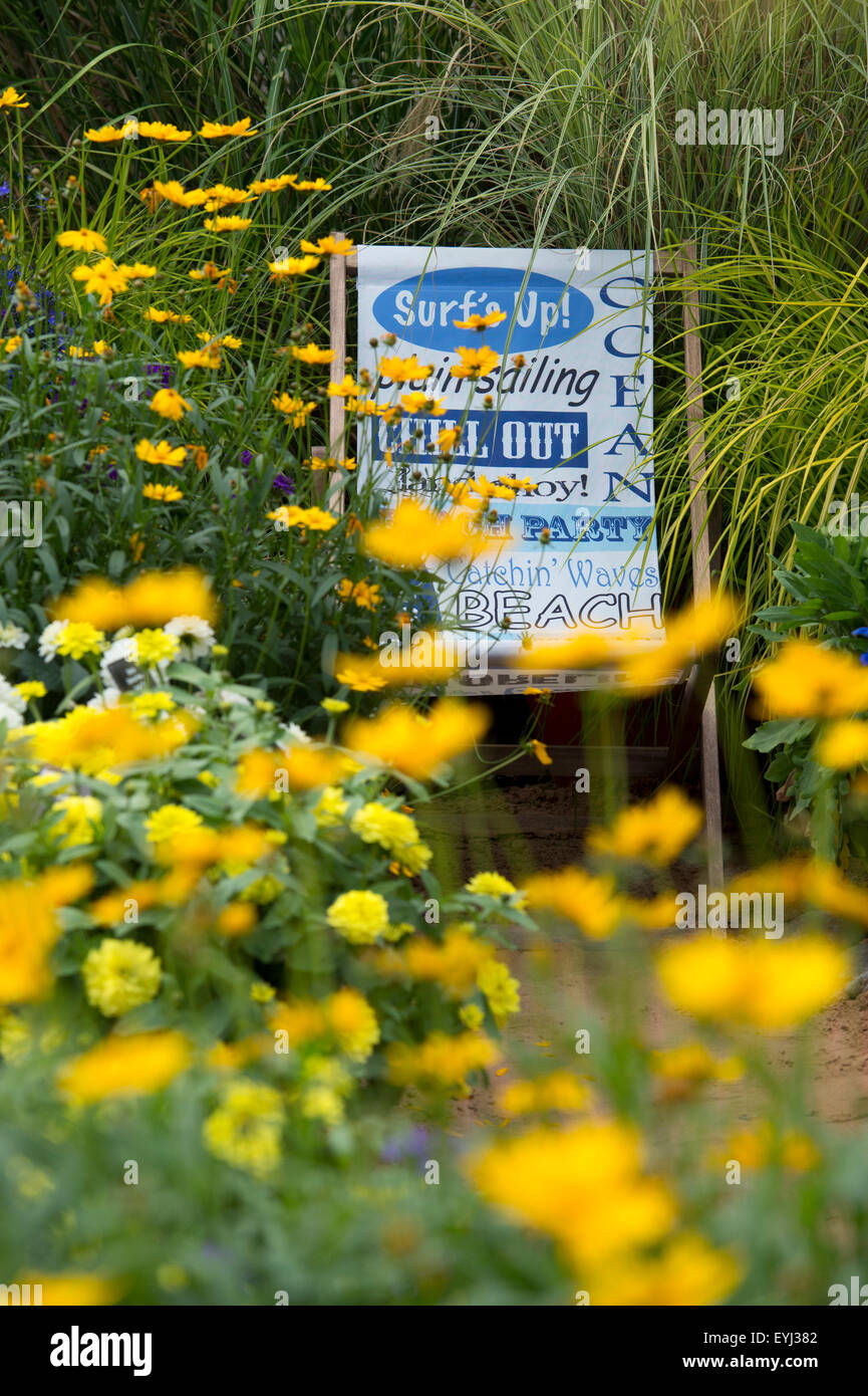 Deckchair in beach style flower show garden at at Ball Colegrave