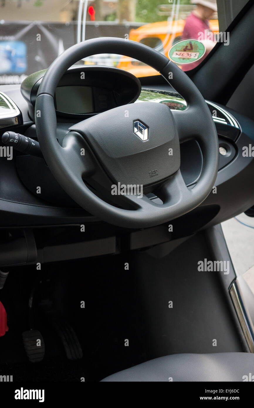 BERLIN - JUNE 14, 2015: Cab of a two-passenger electric vehicle Renault Twizy Z.E. The Classic Days on Kurfuerstendamm. Stock Photo