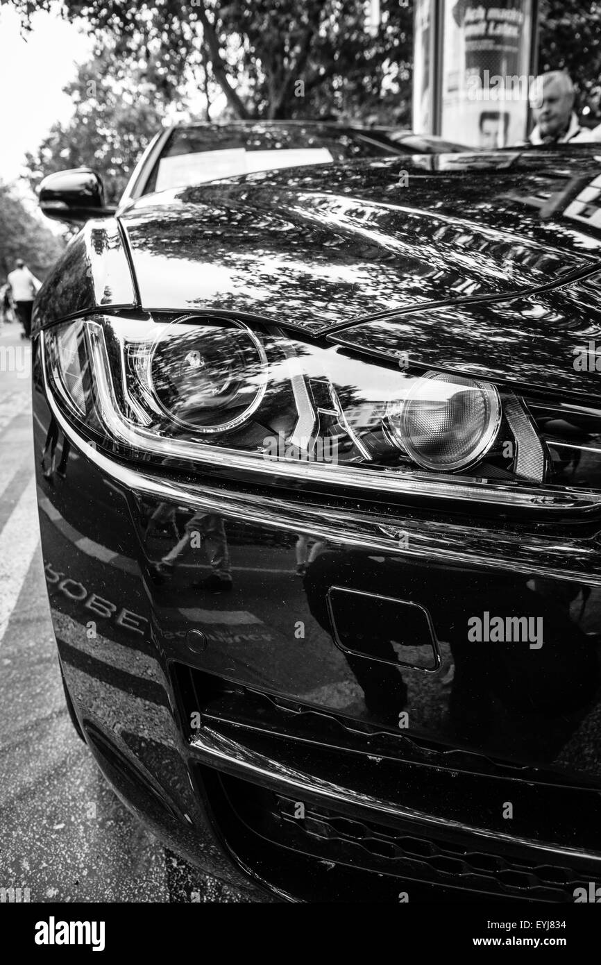 Fragment of the compact executive car Jaguar XE 20D (since 2015). Black and white. The Classic Days on Kurfuerstendamm. Stock Photo