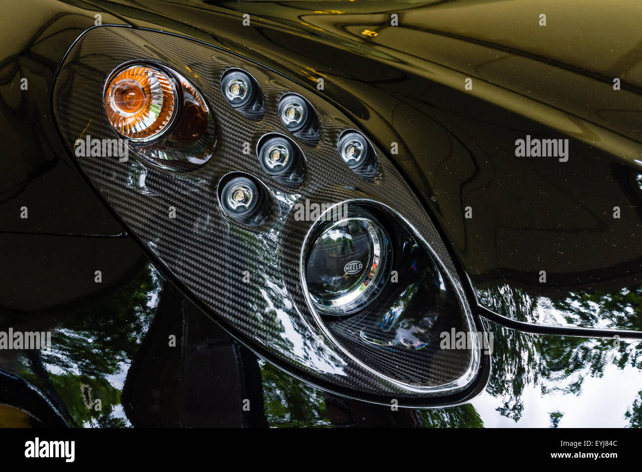 BERLIN - JUNE 14, 2015: Headlamp of the sports car Alfa Romeo 4C (since 2014). The Classic Days on Kurfuerstendamm. Stock Photo