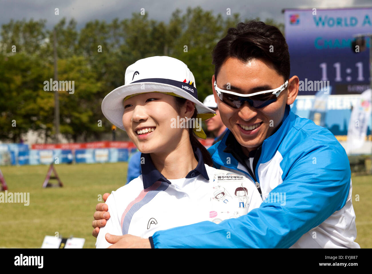 Copenhagen, Denmark, July 30th, 2015: Taipei archer Misun Choi is gratualted by her coach for a good result during Thursday recurve bow shooting at the World Archery Championships in Copenhagen. Credit:  OJPHOTOS/Alamy Live News Stock Photo