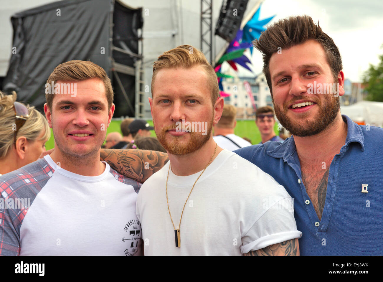 Portrait of three young men at Bristol Harbour Festival, UK Stock Photo