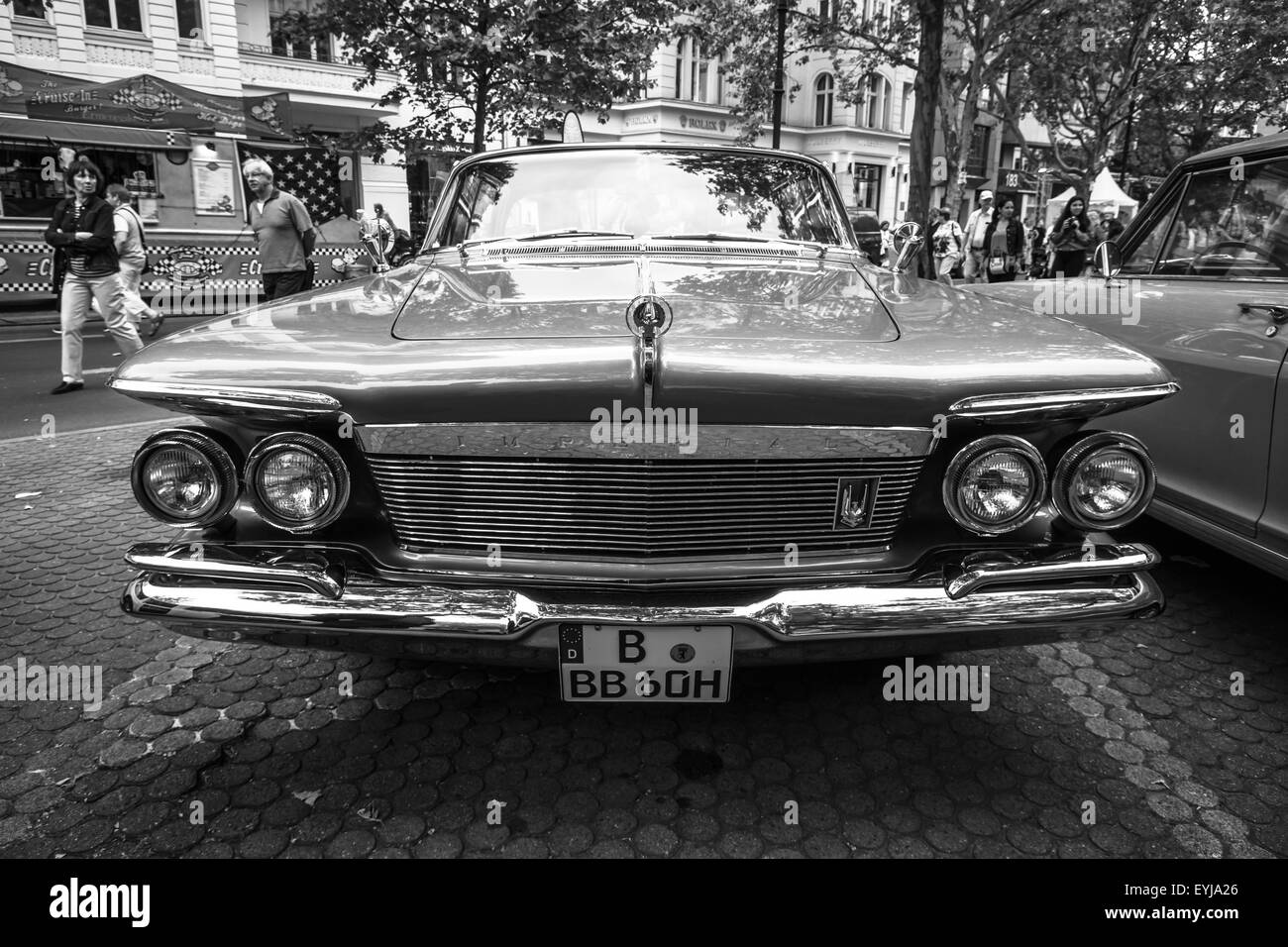 BERLIN - JUNE 14, 2015: Luxury car Imperial Custom 4-door Southampton, 1961. Black white. The Classic Days on Kurfuerstendamm. Stock Photo