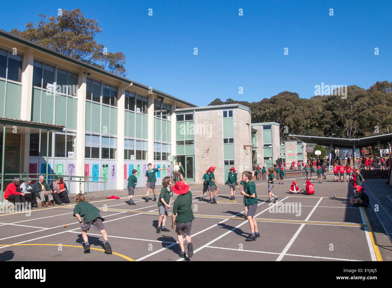 sydney school children playing games in their primary school playground,Sydney,Australia Stock