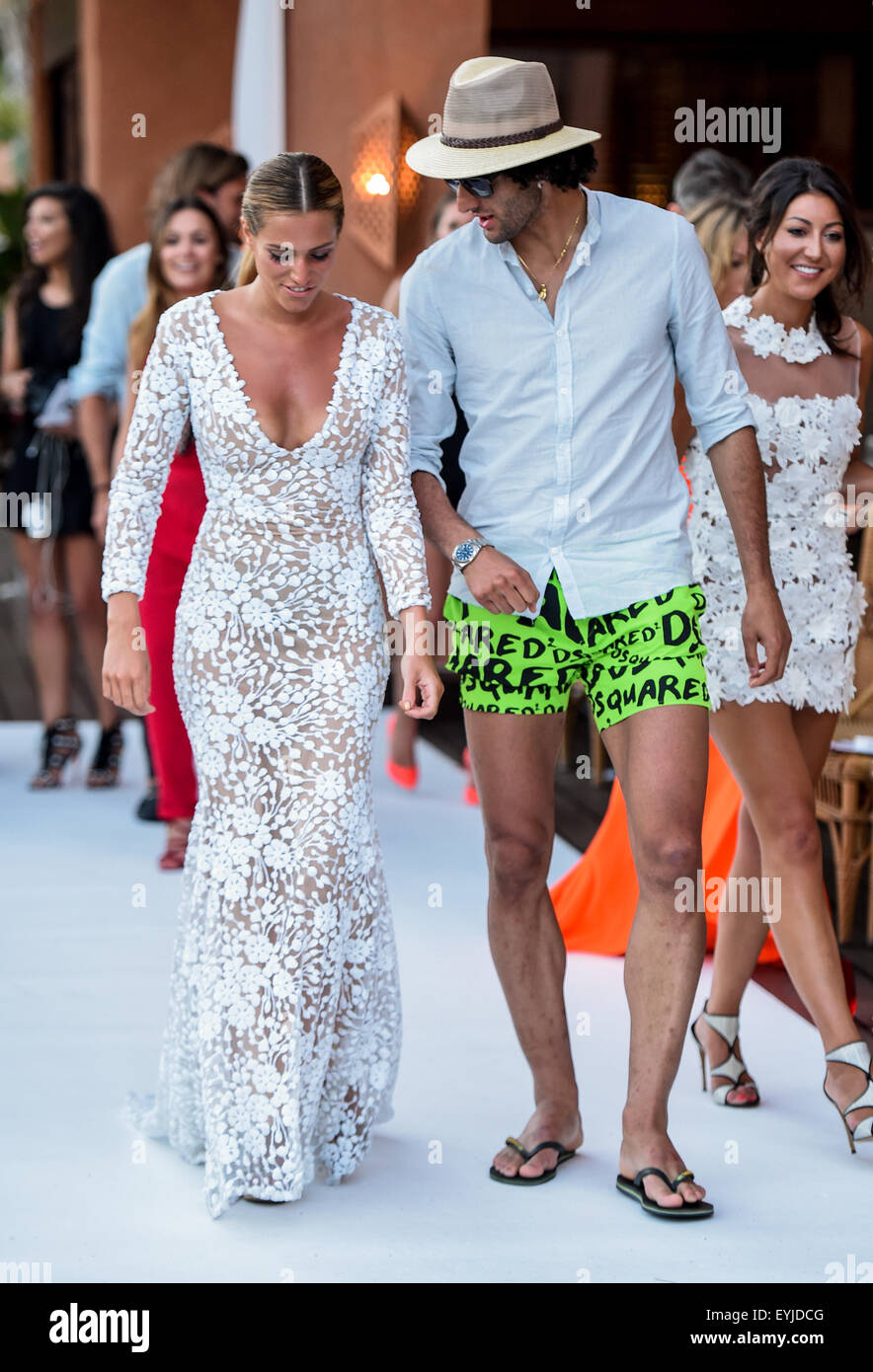 Fashion designer Nadine Merabi launches her new 'Ono Uno' collection  Featuring: Marouane Fellaini, Guest Where: Marbella, Spain When: 29 May  2015 C Stock Photo - Alamy