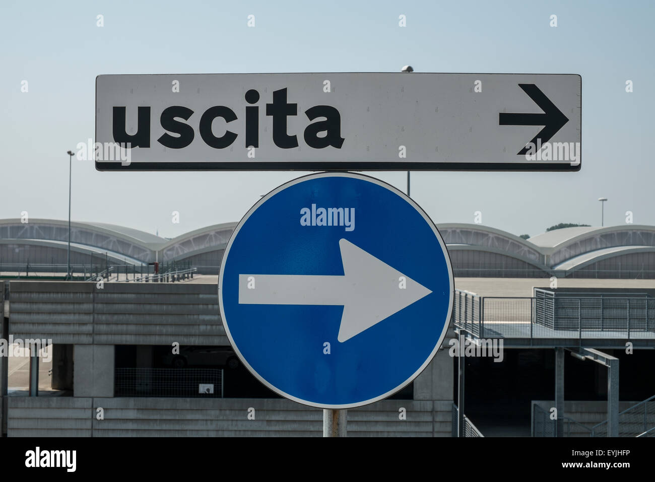 road sign indicating 'exit' in the Italian language Stock Photo
