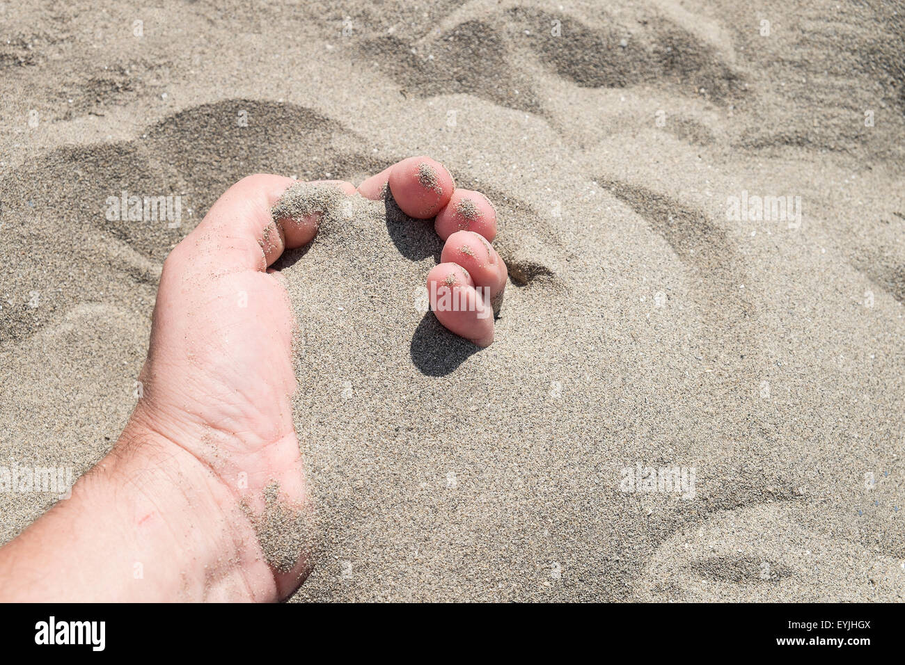 The Hand In The Sand Stock Photo Alamy