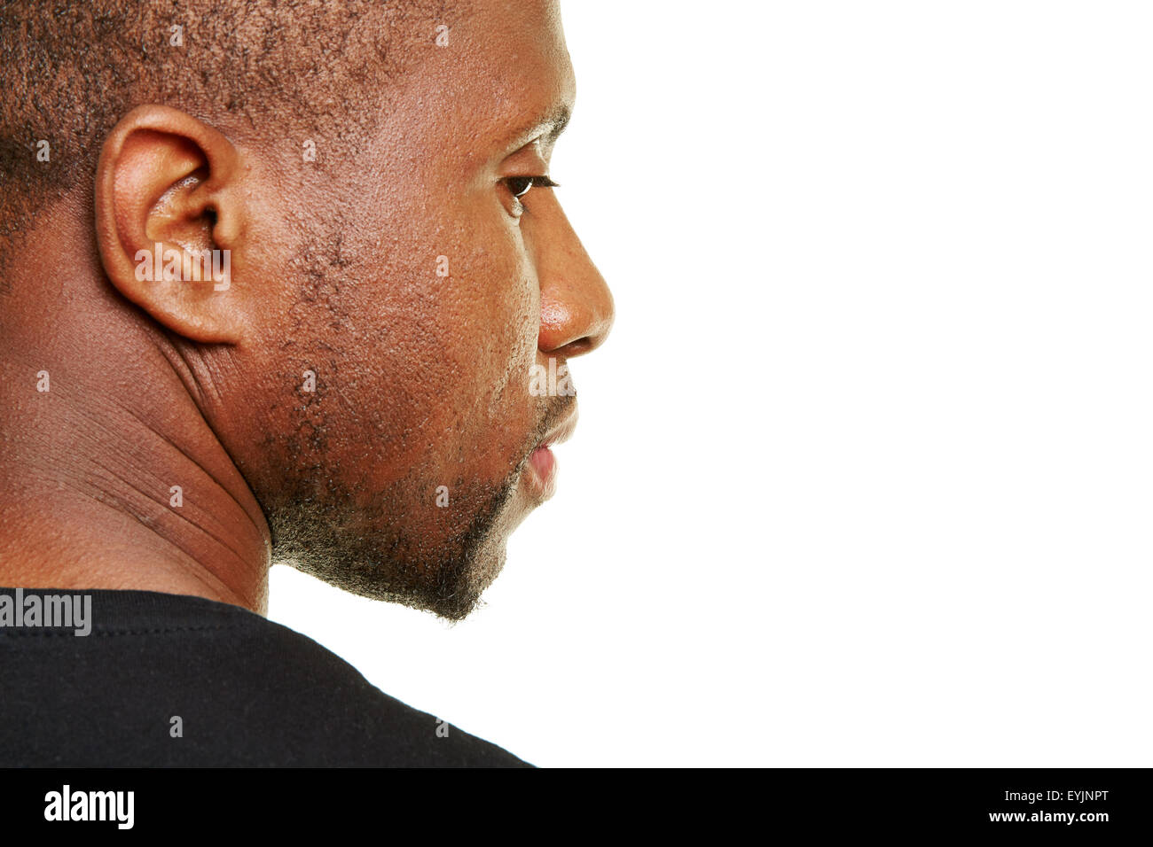 Black man looking pensive to the side Stock Photo
