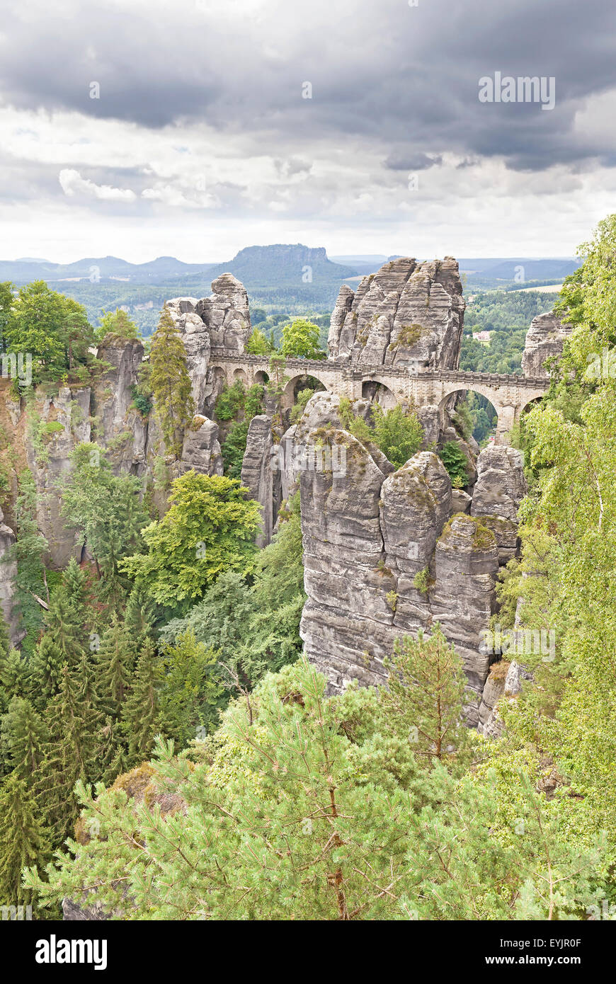 Rainy clouds over Bastei bridge in Saxon Switzerland, Germany. Stock Photo