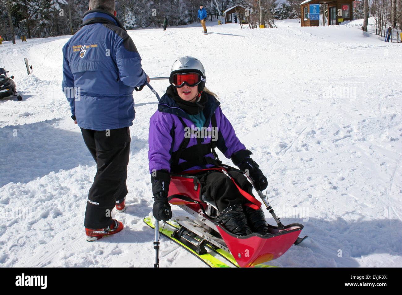 Woman with a disability learning to sit ski at Snowshoe Resort, West Virginia Stock Photo