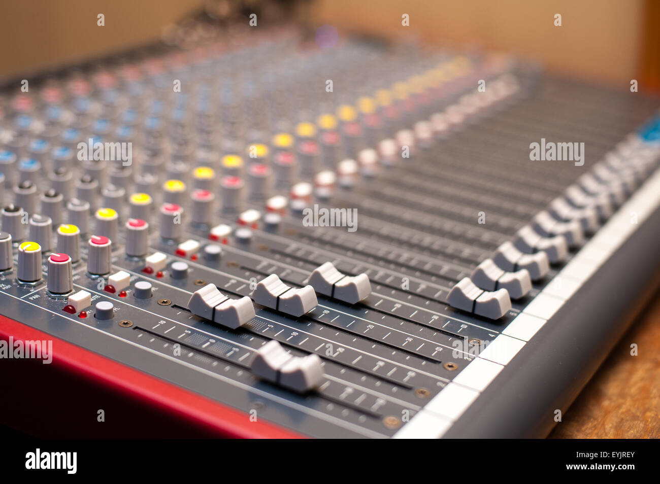 Music studio mixer detail of volume level in selective focus Stock Photo -  Alamy