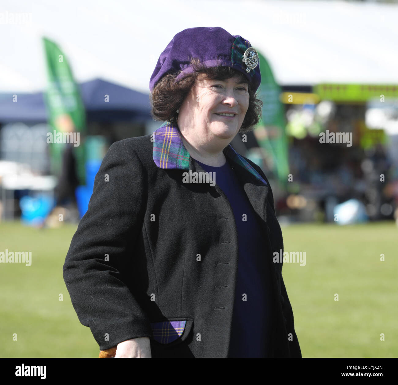 Susan Boyle at West Lothian Highland Games and British Pipe Band Championships in Bathgate, West Lothian.    Susan was Chieftain in 2014 and handed over the Chieftan's Cromach (a shepherd's crook) to 2015 Chieftain, Alistair Todd, general manager of Calor Scotland.  Featuring: Susan Boyle Where: Bathgate, United Kingdom When: 30 May 2015 C Stock Photo