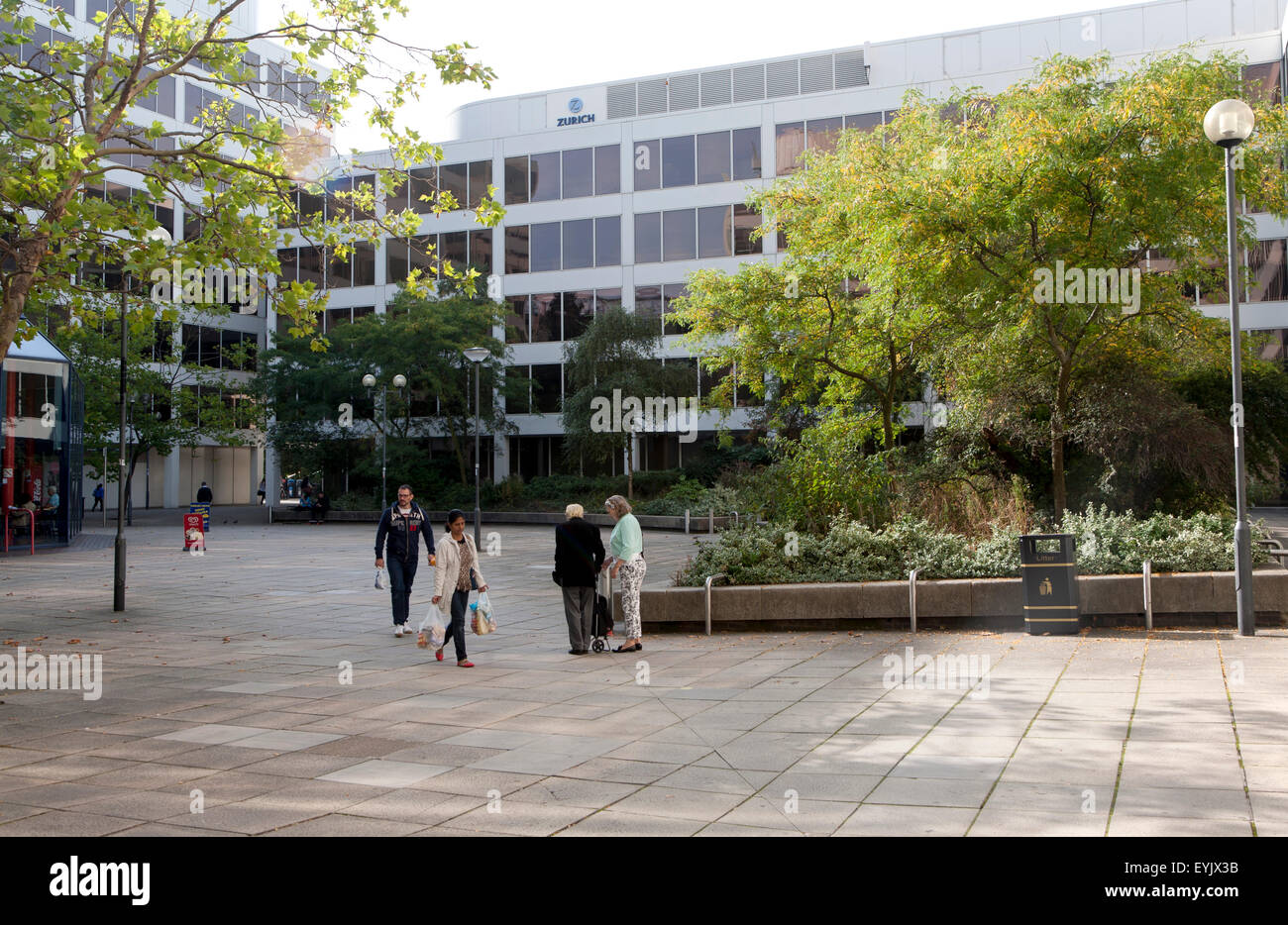 Modern architecture people walking between insurance company offices in