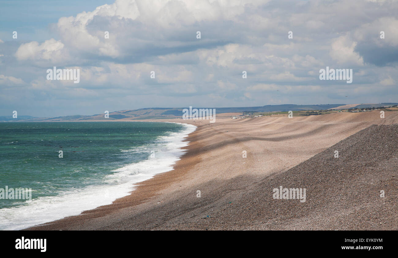 Waves sea sweeping bay and shingle beach of Chesil Beach from Chiswell